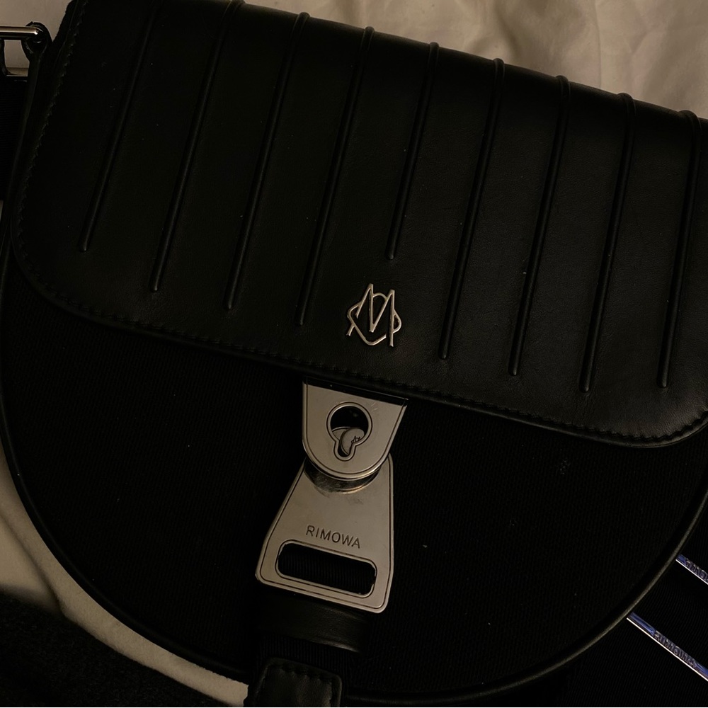 Rimowa never still cross body